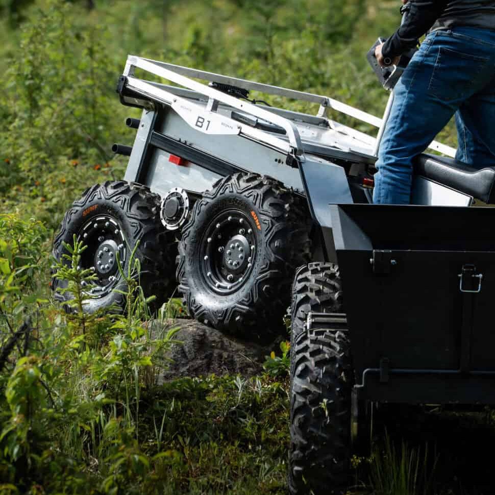 The Beonyx B1 climbing a grassy slope